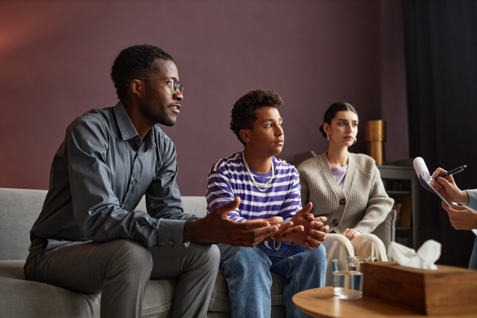 Family visiting a family therapist